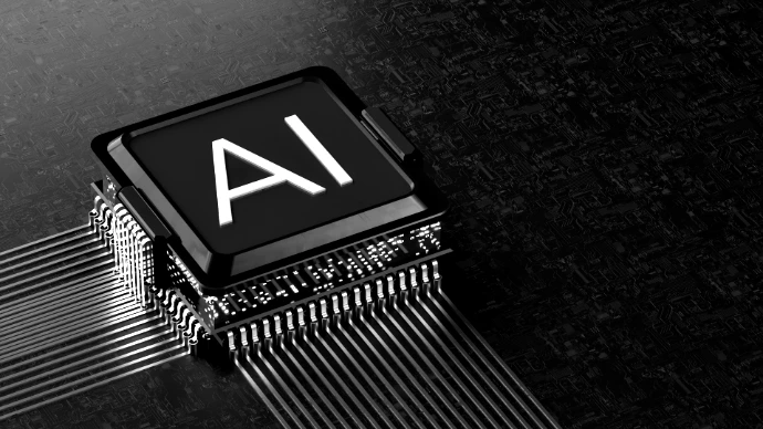 A black computer processor chip with gold pins on a dark circuit board